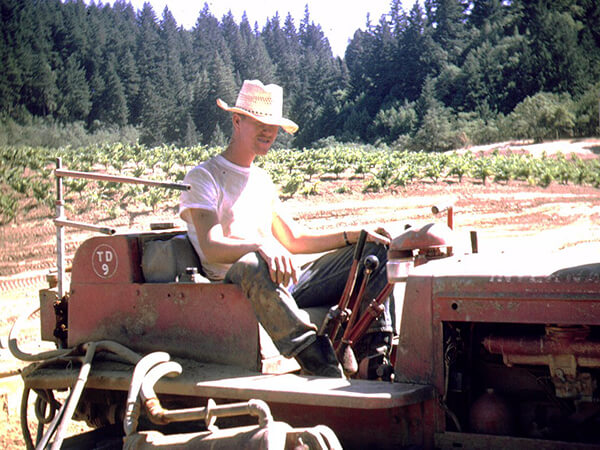 Bill on a tractor in Farmer's First circa August 1964